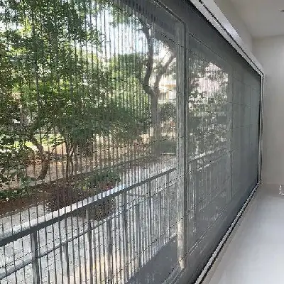 Pleated net on sliding door